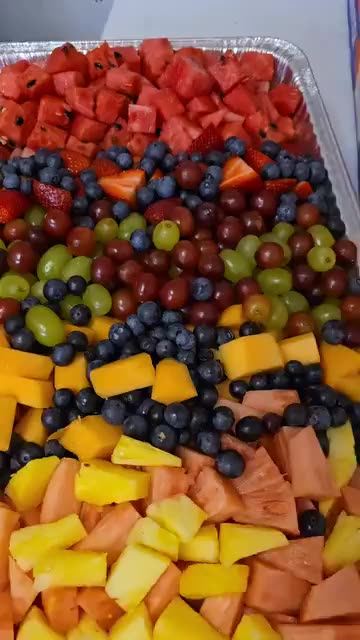 Fruit tray of watermelon, strawberries, blueberries, grapes, cantaloupe and pineapple